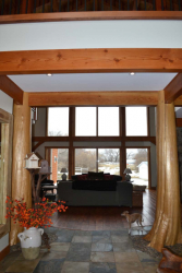Saskatoon Custom Timber Frame Home- Tamlin Homes- cedar log supports