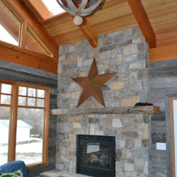 Saskatoon Custom Timber Frame Home- Tamlin Homes- stone fireplace