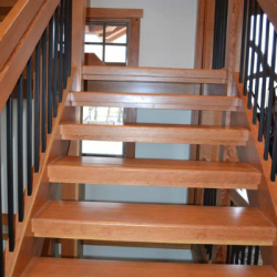 Saskatoon Custom Timber Frame Home- Tamlin Homes-open riser clear fir stairs