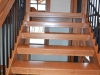 Saskatoon Custom Timber Frame Home- Tamlin Homes-open riser clear fir stairs
