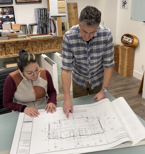 Tamlin-homes-team-looking-at-plans