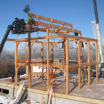 Timber frame installation using crane for Tamlin prefab home